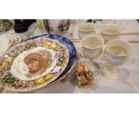 Selection of ceramic plates, four stoneware goblets and a Goebel figurine of a young lady. Not available for in-house P&amp;P