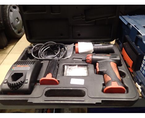 Snap on CTSU561CL cordless screwdriver. Not available for in-house P&P, contact Paul O'Hea at Mailboxes on 01925 659133Condit