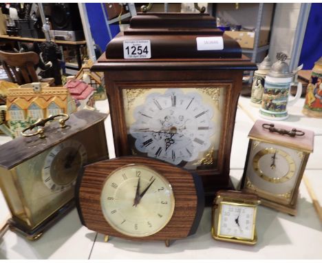 Five clocks including modern reproduction quartz bracket clock. Not available for in-house P&amp;P, contact Paul O'Hea at Mai