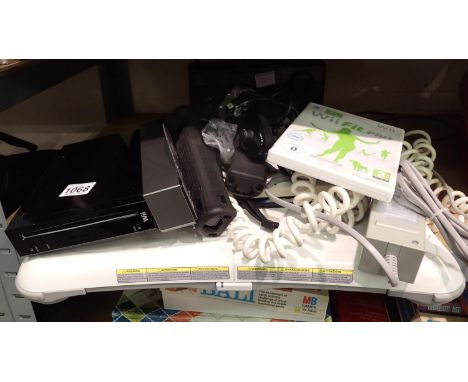 Nintendo Wii with Wii fit board and accessories. Not available for in-house P&P, contact Paul O'Hea at Mailboxes on 01925 659