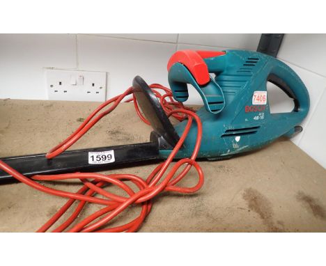 Bosch AHS 48 15 electric hedge trimmer. Not available for in-house P&P, contact Paul O'Hea at Mailboxes on 01925 659133Condit