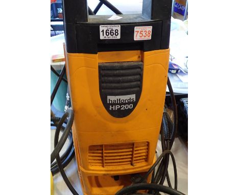 Halfords HP200 pressure washer with lance. Not available for in-house P&P, contact Paul O'Hea at Mailboxes on 01925 659133Con