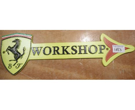 Cast iron Ferrari large workshop arrow plaque, 40 x 12 cm. P&amp;P Group 2 (£18+VAT for the first lot and £3+VAT for subseque