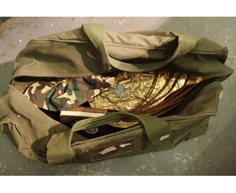 Large military green canvas bag containing fireside bellows, camouflage hat etc. Not available for in-house P&amp;P, contact 