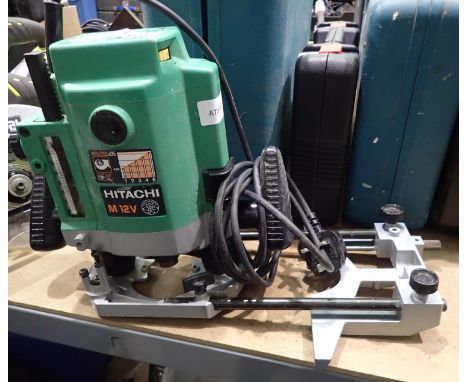 Hitachi M 12v routing tool. Not available for in-house P&P, contact Paul O'Hea at Mailboxes on 01925 659133Condition Report: 