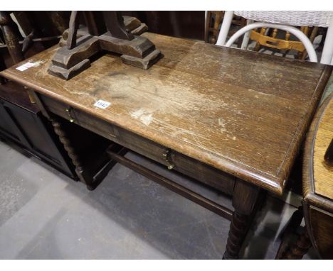 Oak two drawer table on barley twist supports, 92 x 48 x 72 cm H. Not available for in-house P&amp;P, contact Paul O'Hea at M