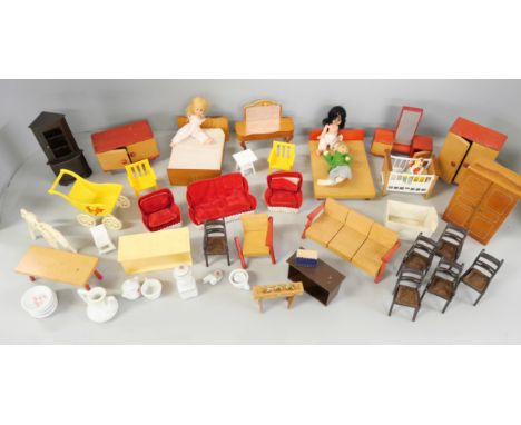 A collection of vintage dolls house furniture 