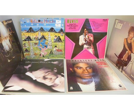 Seventeen LP records, pop and rock, Talking Heads, Michael Jackson, Slade, Genesis, etc.