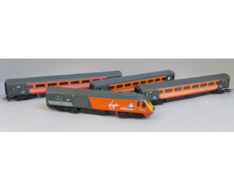 A Lima Virgin Trains 00 gauge model railway engine and three coaches 