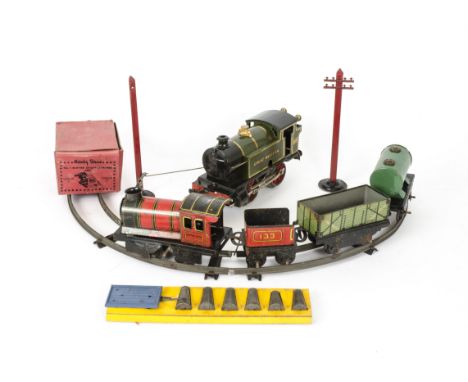 Clockwork O Gauge Trains by Hornby and Brimtoy, a Hornby M3 Tank locomotive in GWR green as no 6600, G, body good, mech teste