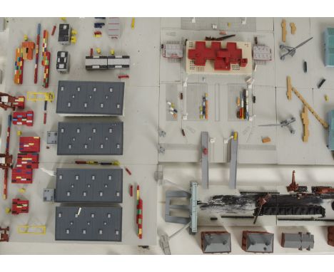 Large collection of plastic and metal 1:1250 or similar scale Dockside quays with Warehouses Cranes and Dock Buildings, most 