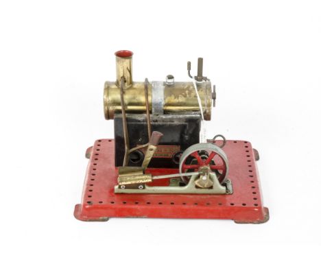 A Mamod SE1 Stationary Steam Engine, on red base for Meccano fitting, single-cylinder oscillating engine, fitted with early-t