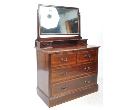 Edwardian mahogany inlaid dressing table chest of drawers. Having a mirror top with gallery raised shelf having drawers. The 