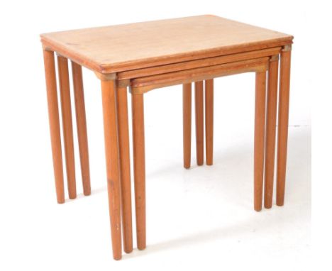 Danish Modern Design - A vintage 20th century teak wood nest of three graduating teak tables. Rectangular form with graduatin