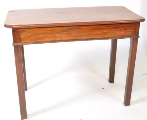 A George III 18thcentury mahogany hall side writing table / console table. Featuring a rectangular form table top with curved