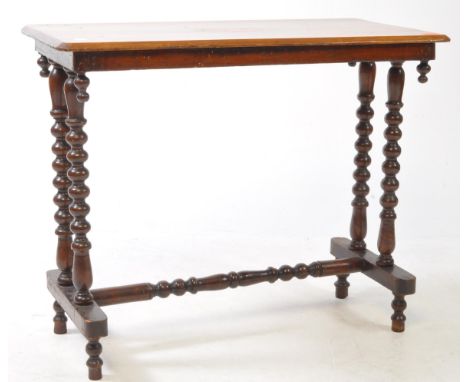 A Victorian 19th century inlaid mahogany bobbin console / writing desk table. Raised on bobbin legs united by a turned 'H' st