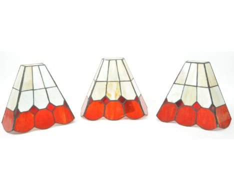 Tiffany Manner - A matching set of three uplight wall lamp lights. Tapering cone form stained glass lead lined red and white 