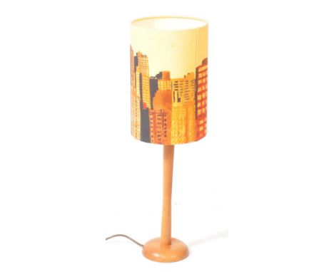 A vintage 20th century tall wooden desk / table top lamp light. With a circular shade depicting city skyline / cityscape.65cm