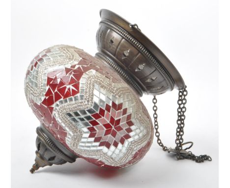 A vintage 20th century Morrocan pendant ceiling hanging light. Having a bulbous mosaic pattern red and white pieces. Pierced 