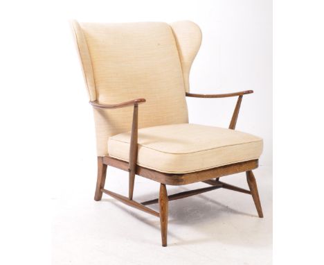 Lucian Ercolani - Ercol - A retro vintage 20th-century beech and elm lounge chair / armchair by Ercol. With an upholstered cr