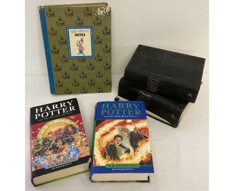 4 first edition Harry Potter books together with a 1965 Walt Disney America Story Book. A first edition of Harry Potter and t
