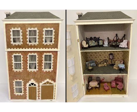 A vintage wooden 3 storey Town House dolls house with contents. Contains a quantity of handmade wire framed dolls house furni
