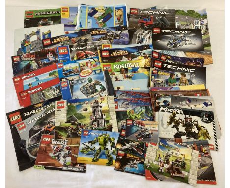 A quantity of assorted Lego instruction manual, leaflets and posters. To include: Star Wars, Racers, Ninjago, Knights Kingdom