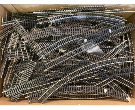 A box of assorted OO gauge model railway track and points.  