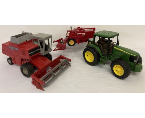 3 farm machinery vehicles. A diecast and plastic Massey Ferguson 850 combine by Ertl. Together with Massey Ferguson 760 combi