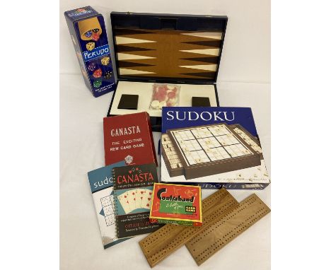 A quantity of assorted vintage and modern games. To include: cased Backgammon set (in as new condition), boxed Sudoku game, v