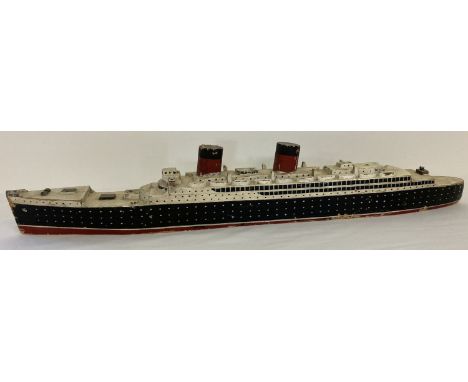 A vintage painted wooden model of a passenger liner.  Approx. 70cm long x 11.5cm tall.
