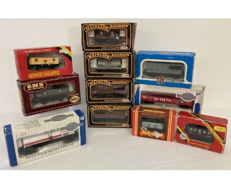 A collection of 11 boxed OO gauge model railway wagons to include tankers. Examples by Hornby, Airfix, Bachmann Silver Series