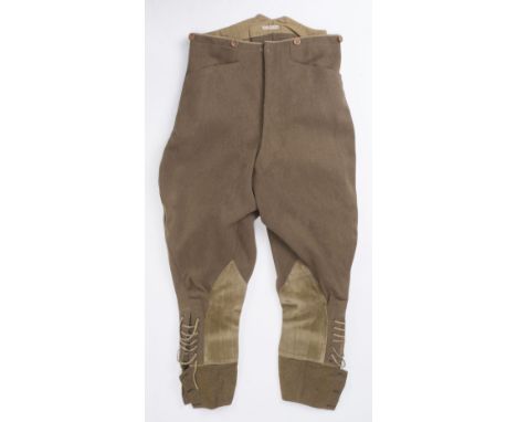 * Royal Flying Corps. A pair of WWI RFC Bedford cord breeches, green cloth with brown composite buttons, integral velvet spat