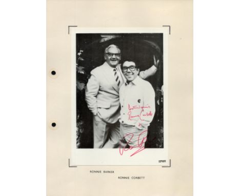 Two Ronnies; Ronnie Barker and Ronnie Corbett signed 8x6 inch approx black and white photo mounted on A4 paper. The Two Ronni
