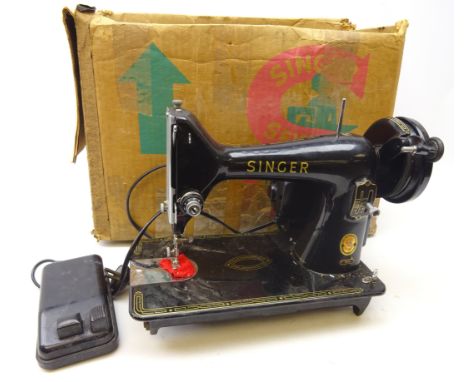 Singer Sewing Machine, model 99K, with some attachments, foot pedal and original cardboard box   Condition Report   Click her