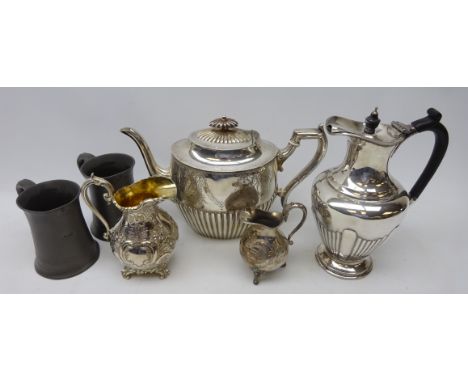 Victorian silver-plated teapot with engraved decoration, Victorian silver-plated coffee pot, two matched jugs & two pewter ta