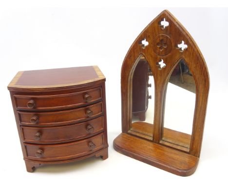 Small bow front four drawer trinket chest and a Gothic style mirror, H40cm    Condition Report   Click here for further image