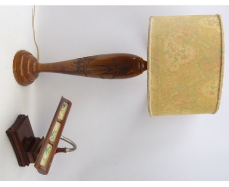 Malayan carved hardwood table lamp with shade, H83cm and a bankers style hardwood desk lamp (2)   Condition Report   Click he