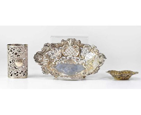 LEVI &amp; SALAMAN; a Victorian hallmarked silver pierced bottle cover, height 8.5cm, Birmingham 1898, and a pierced oval dis