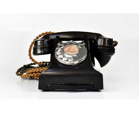 A vintage Bakelite C55 pattern telephone converted to modern wiring, with central panel for Mountwood 3754.