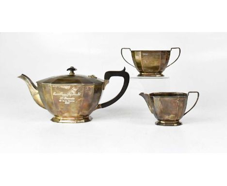 COOPER BROTHERS &amp; SONS; an Elizabeth II hallmarked silver tea service, comprising teapot with ebonised handle and finial,