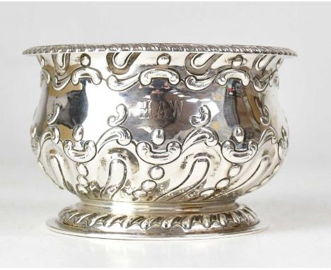 HARRISON BROTHERS &amp; HOWSON; an Edward VII hallmarked silver bowl with repoussé decoration and initialled 'HAW', Sheffield