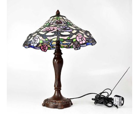 A Tiffany-style table lamp, the shade with leaded glass embossed roses, on a moulded column base, height 51cm.Condition Repor