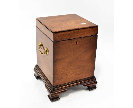 A Georgian mahogany four division bottle caddy with hinged lid and brass swing handles, raised on bracket feet, 41 x 29.5 x 2