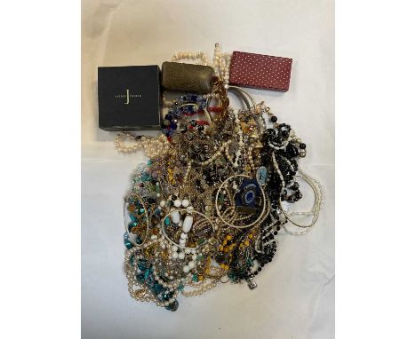 A good quantity of modern, vintage and antique costume jewellery including necklaces, bracelets, association badges, hinged b