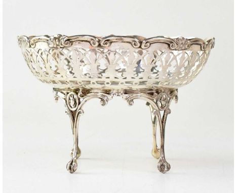 ALEXANDER CLARK &amp; CO LTD; a George VI hallmarked silver pierced bowl raised on four slender legs to ball and claw feet, 1
