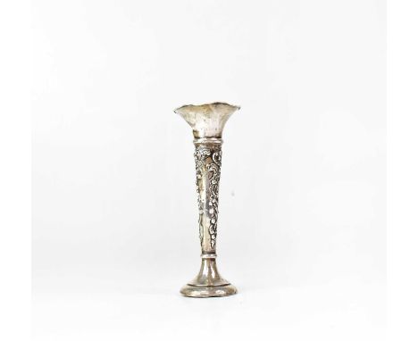 A hallmarked silver loaded spill vase with embossed decoration, marks rubbed (af).