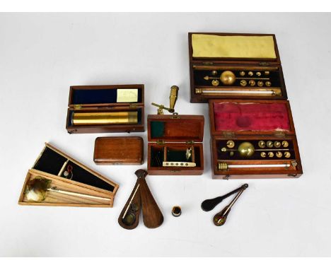 Various cased items to include a cased Sikes Hydrometer, a Davon Micro telescope, four small case stands, and two cased sets 