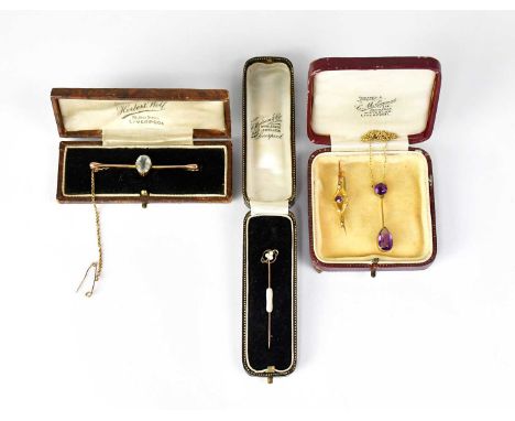 A tie pin with 15ct yellow gold finial set with three seed pearls, marked '15' to mount and a 9ct gold tie pin set with white