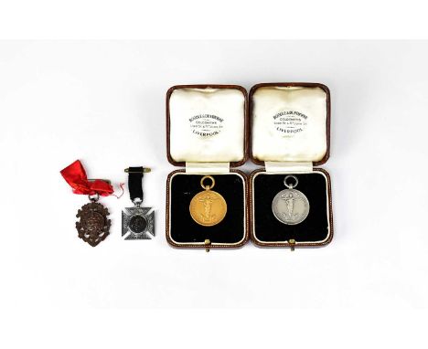 Three Liverpool related medals, comprising two inscribed 'Liverpool Motor Club Waterloo Speed Trials 1923 Yaxley', one hallma
